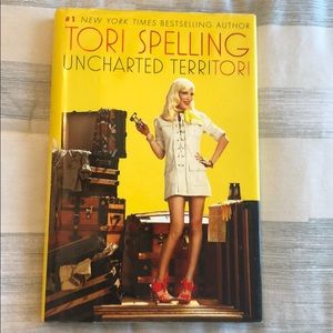 Signed hardcover Uncharted Territori Tori Spelling